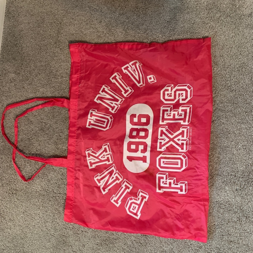 Pink Victoria’s Secret bag.